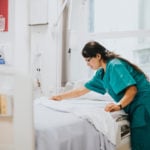Nurse Making Bed