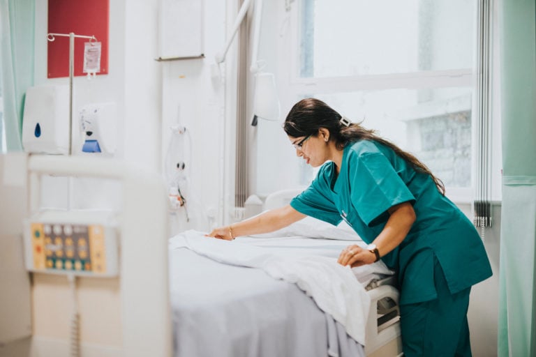 Nurse Making Bed