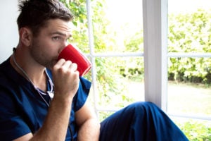 Male Nurse Drinking Coffee on Break