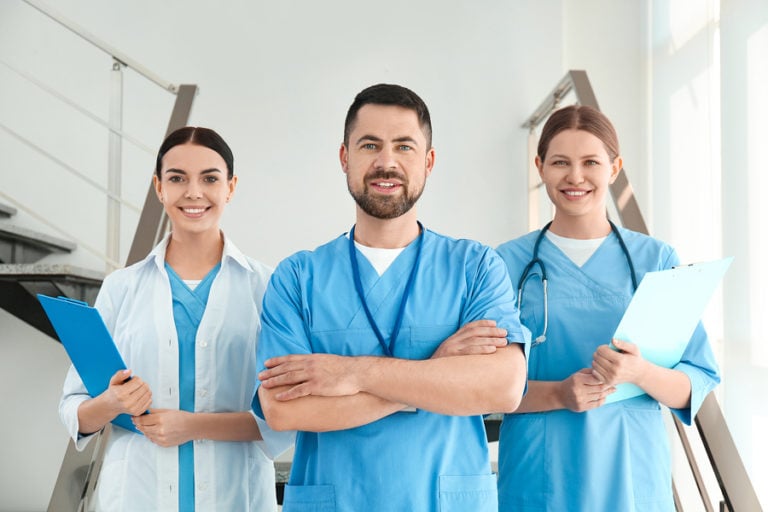 Group of nurses standing in stairwell