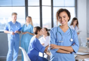 Nurse educator standing in front of class