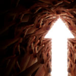 Light arrow pointing up surrounded by hands.