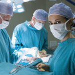 CVOR nurse in the the operator room with other doctors and nurses.