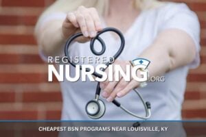A nurse holds out a stethoscope arranged in the shape of a heart.